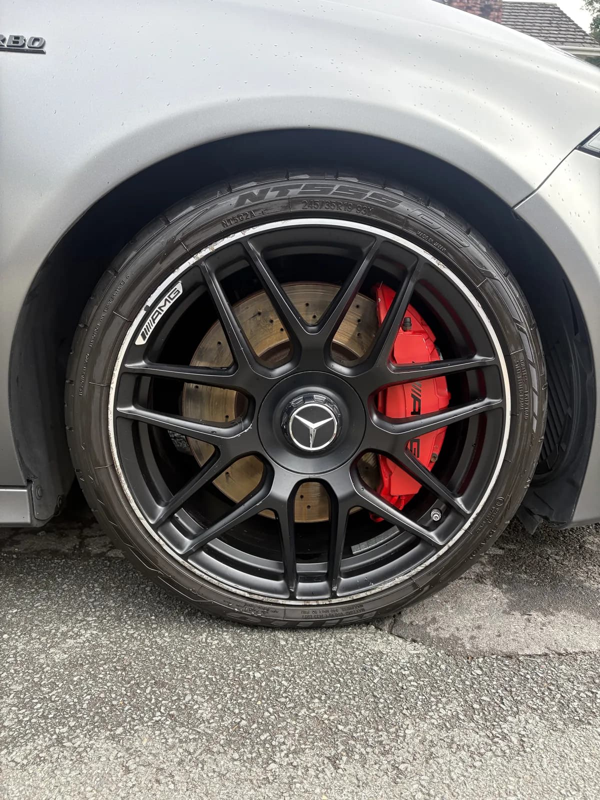 Mercedes-AMG wheel with a red brake caliper